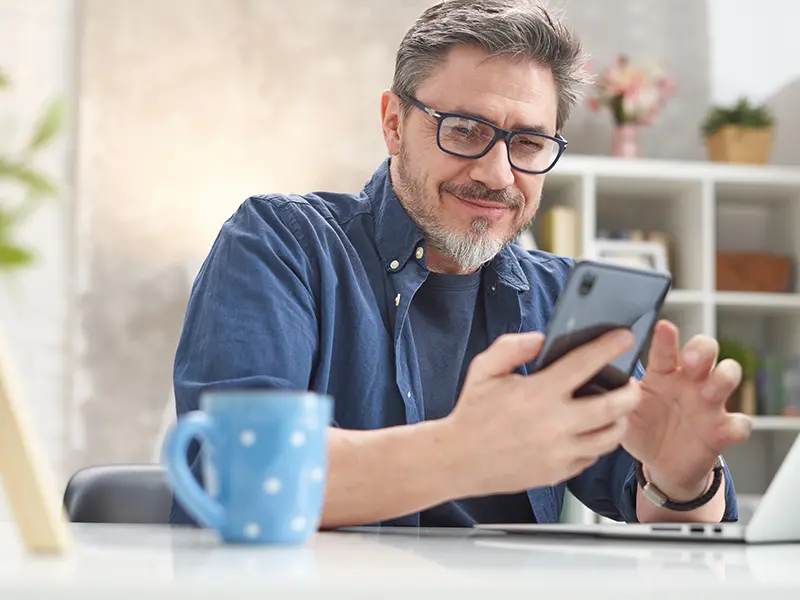 man banking on phone