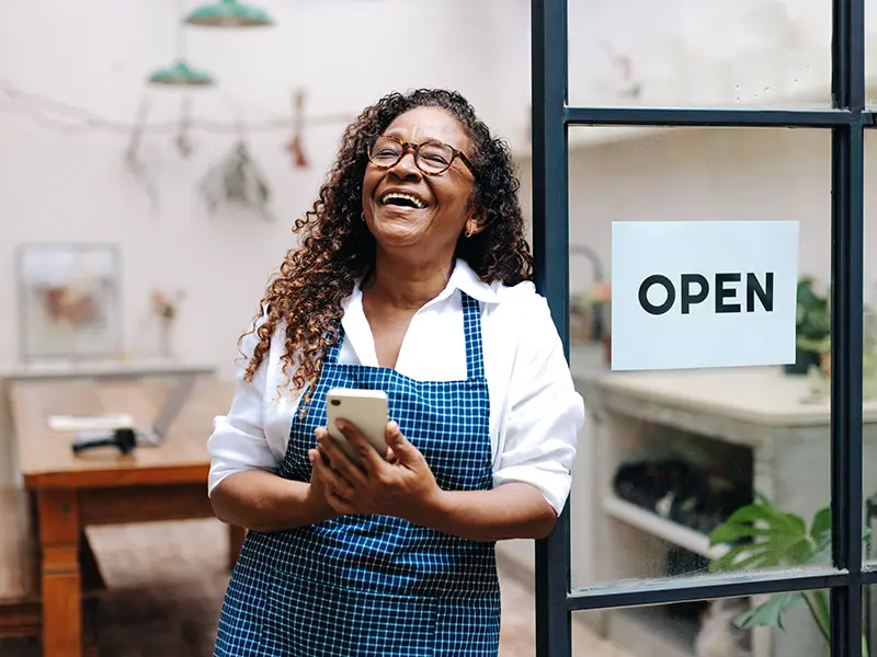 business woman holding phone
